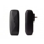 The Diamond plug-in scent diffuser, black, in a wall outlet