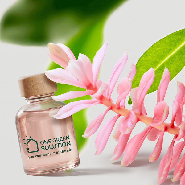 White Tea & Ginger Flowers Signature Scent oil bottle with pink ginger flowers and green leaves